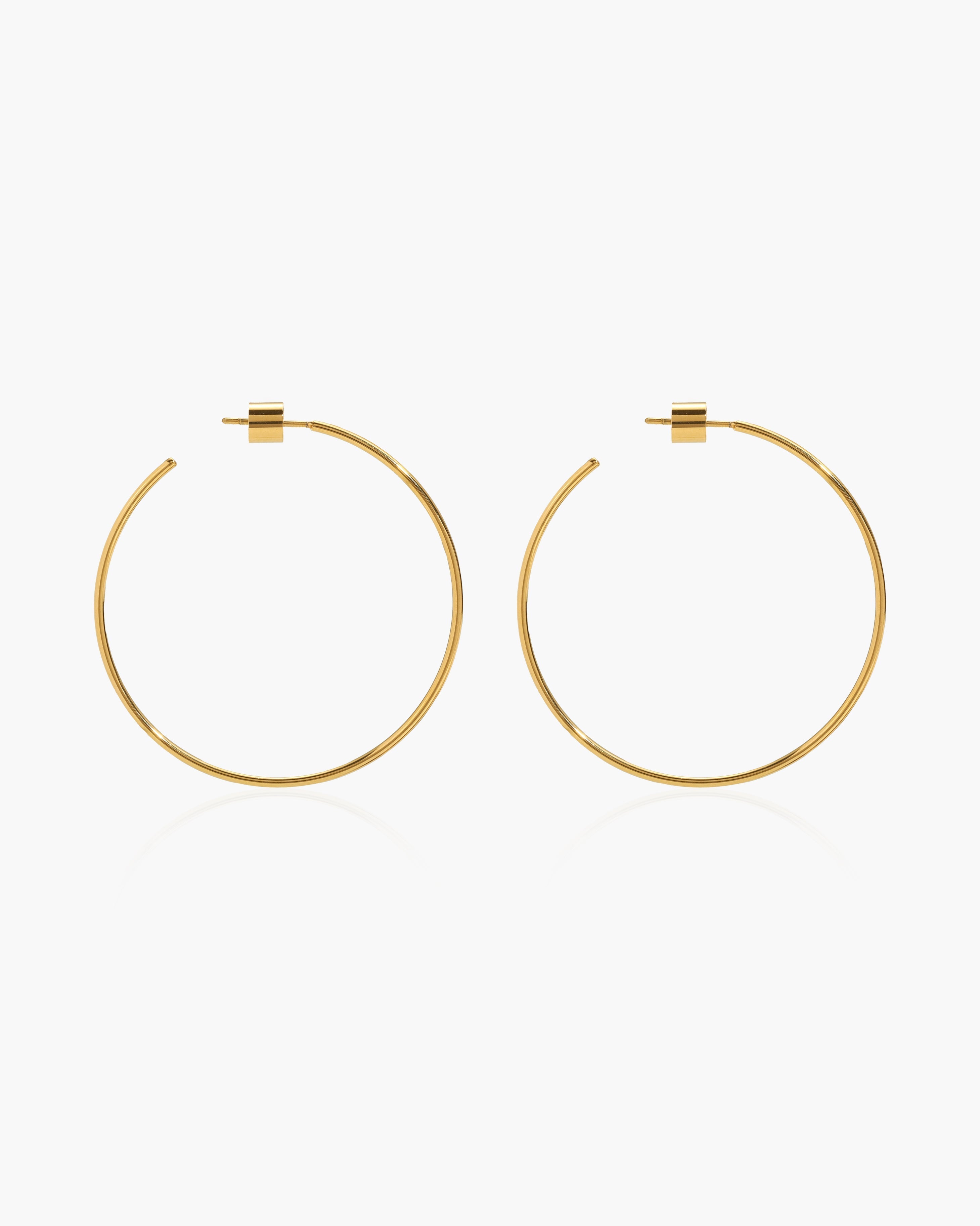 Gold Skinny Hoop Earrings en route jewellery