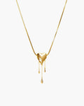 Venom’s Golden Drip Heart Necklace